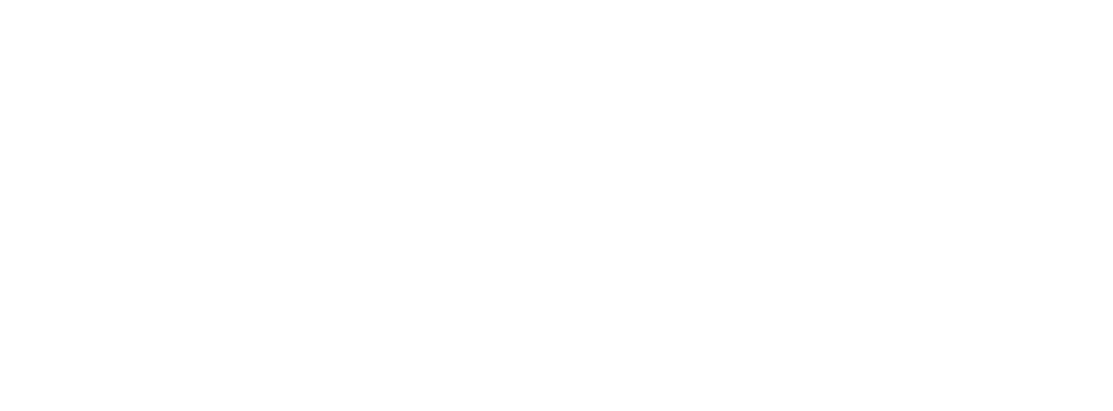 White logo of Mid Michigan barns in Evart, MI