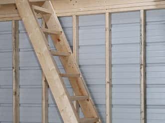 Stairs leading up to the loft of a lofted barn