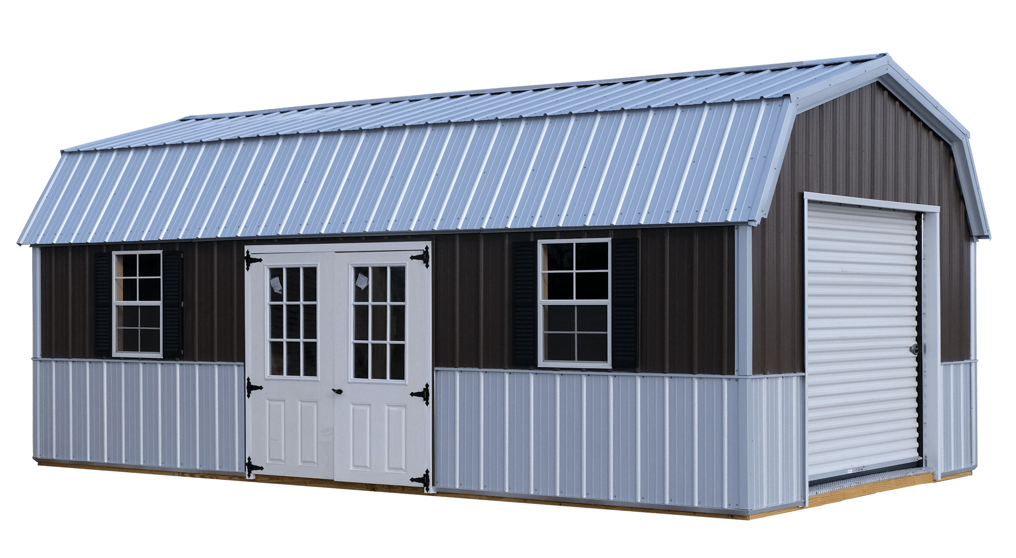 Metal lofted shed with windows, double doors, and a roll up door on the end.